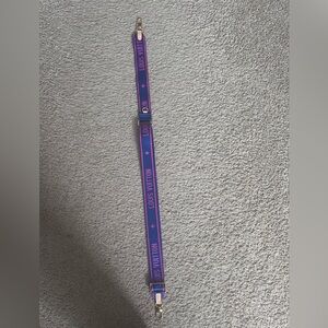 Blue and pink purse strap